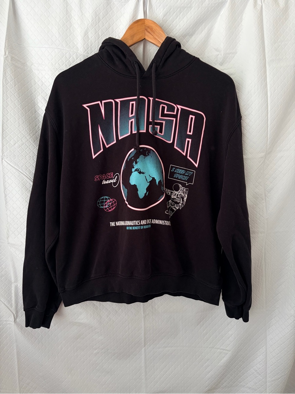 Divided Black Hoodie with Pink and Teal Graphic